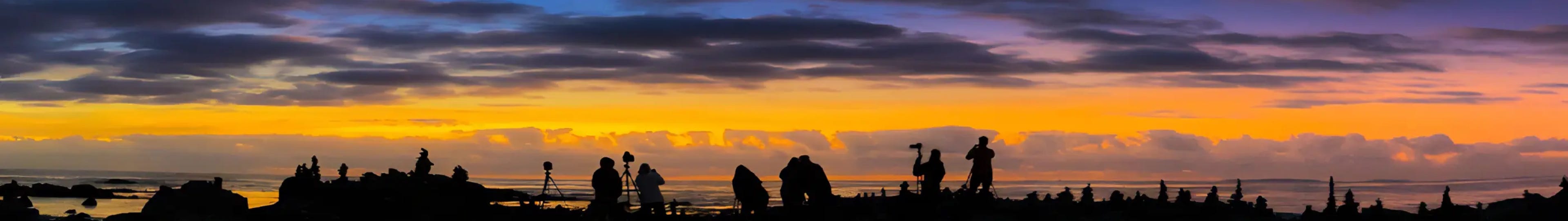 People photographing a sunrise