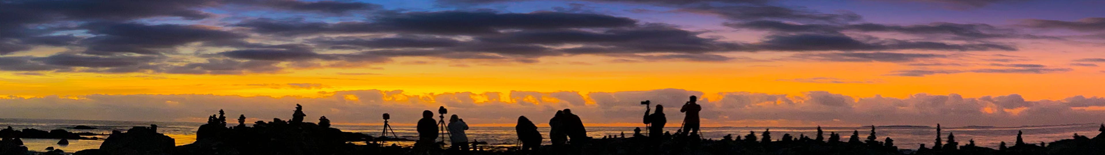 People photographing a sunrise