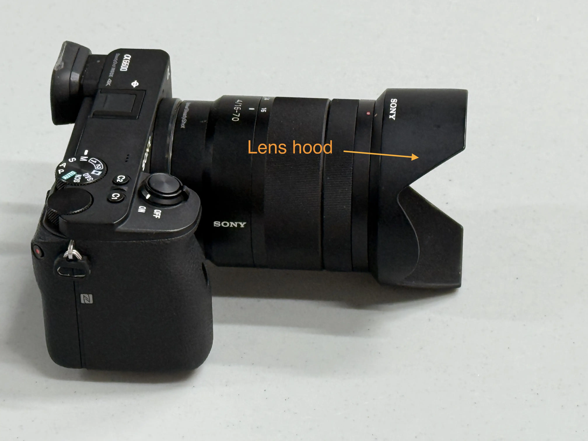 Camera with lens hood 